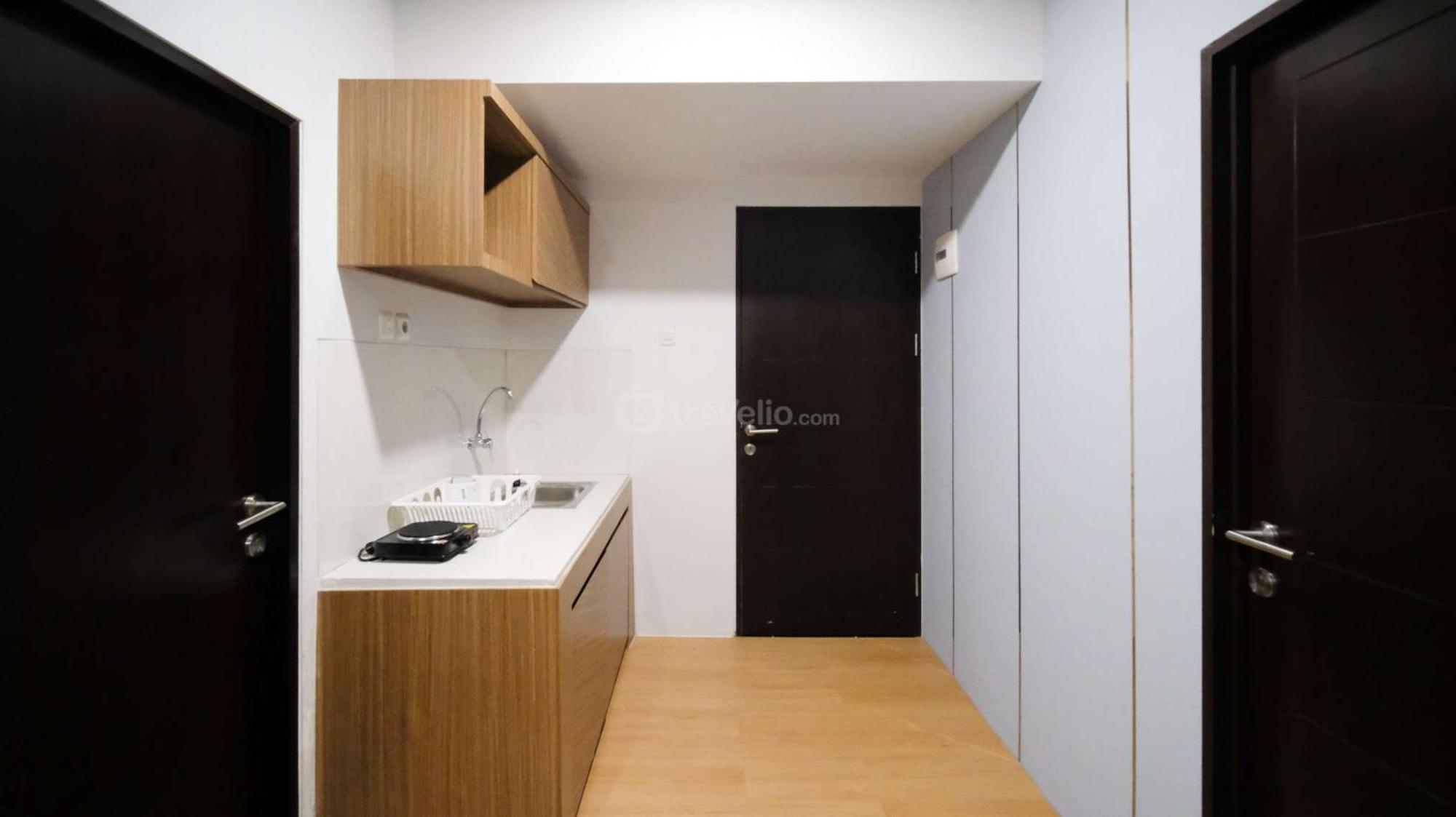 Apartemen New And Homey 2br At Suncity By Travelio